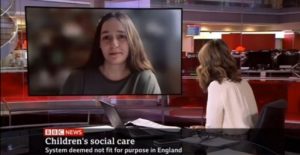 A picture containing text, person, indoor, computer Description automatically generated